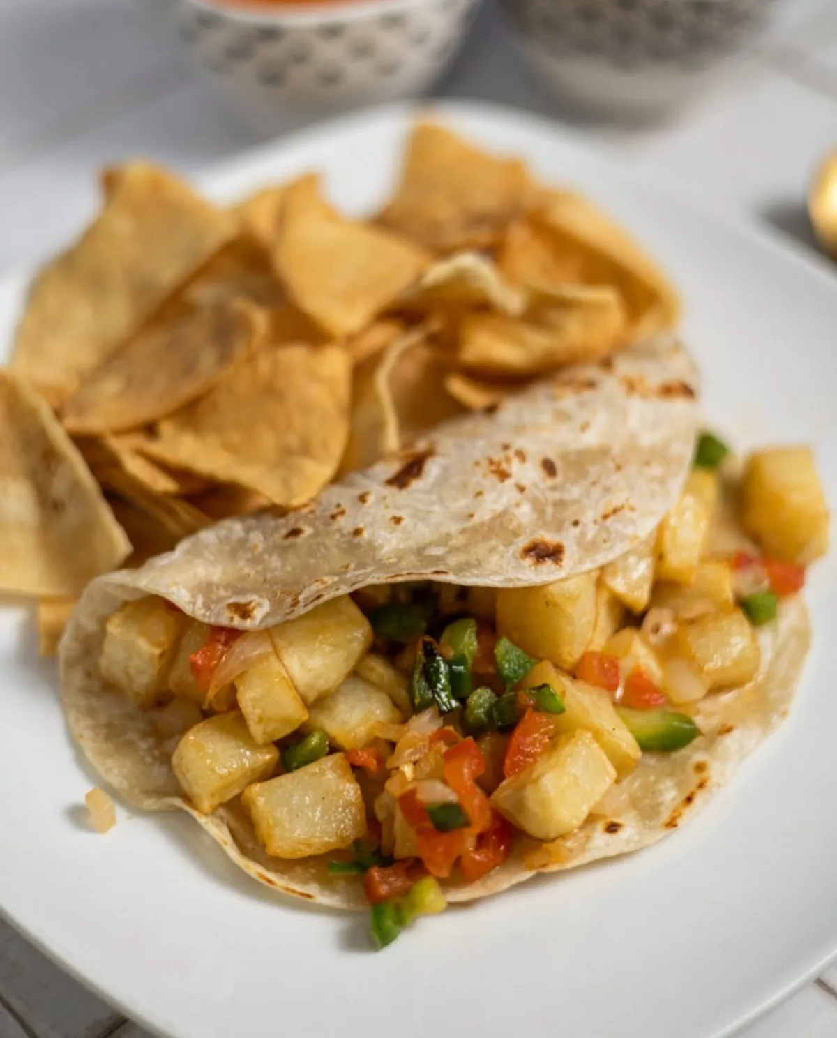 Papa a la Mexicana taco with potatoes, tomato, onion and jalapeño from Loredo's Tortilleria
